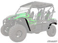 A Kawasaki Teryx 4 S is shown, with its Low Profile Fender Flares highlighted below the doors. The rest of the vehicle is faded, drawing attention to the Kawasaki Teryx 4 S Low Profile Fender Flares accessory.