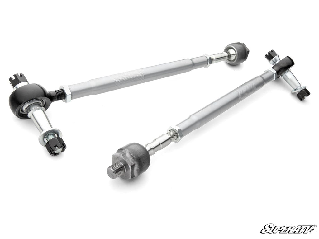 Two Kawasaki Teryx S Heavy-Duty Tie Rod Kit rods with silver metal bodies, black ball joints, and nuts at each end are arranged diagonally on a white background. The rods feature threaded sections and hex adjusters. The SuperATV logo is in the bottom righ