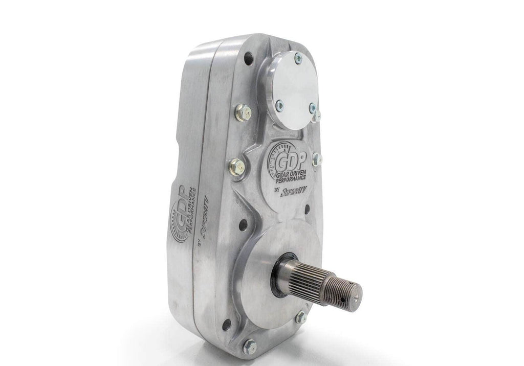 The Can-Am Defender 8 Portal Gear Lift is a metallic, rectangular gearbox with beveled edges, engraved “GDP Gear Driven Performance,” with bolts, a splined shaft at the bottom front, and a rounded top cover on a plain white background.