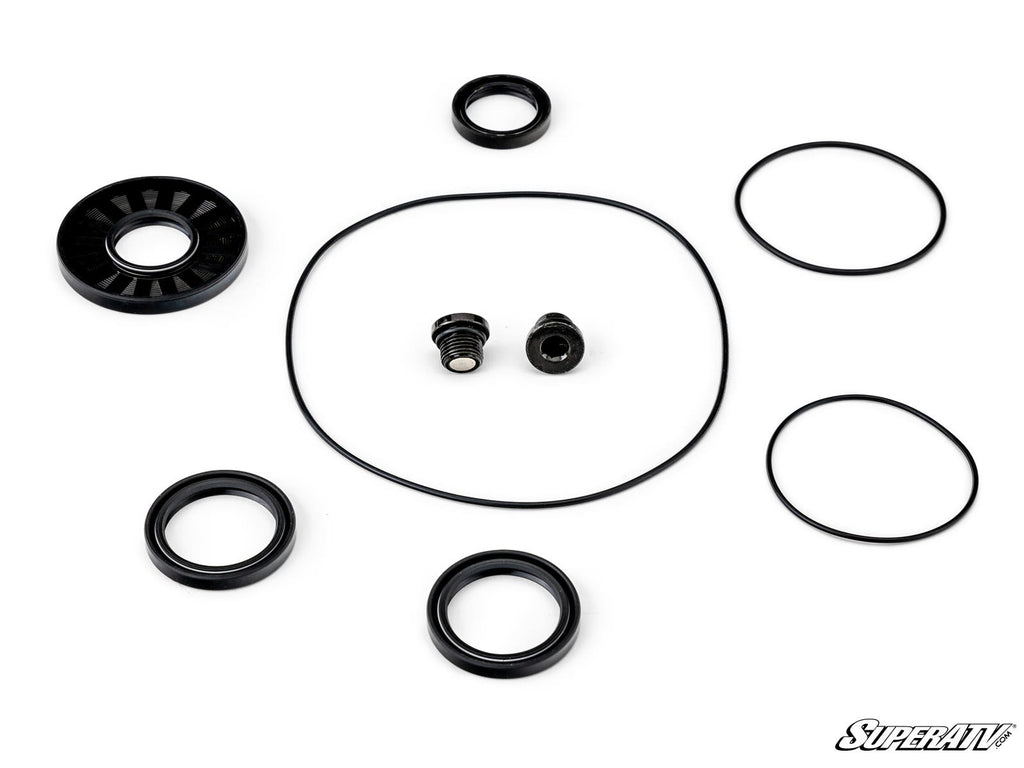The Polaris RZR XP 1000 Differential Hub and Axle Upgrade Kit includes black rubber and metal seals, O-rings, washers, and two small fittings arranged symmetrically on a white background with the SuperATV logo in the bottom right corner.