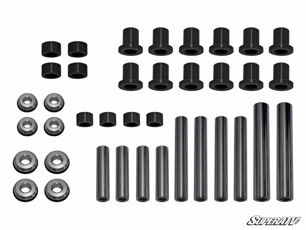 A neatly arranged set of Polaris RZR S 1000 Rear A-Arm Bushings, washers, and sleeves of various sizes on a white background with the SuperATV logo in the bottom right, designed for automotive or machinery use.