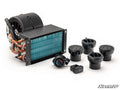 The Polaris General 1000 In-Dash Heater kit features a blower fan, rectangular heater core with visible copper tubing, three round adjustable air vents, a single control knob with blue/red heat settings, rocker switch, and the SuperATV logo.