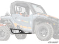 The Polaris General XP 1000 Tree Kickers are shown in black metal, mounted on the side of a gray and orange off-road utility vehicle with large rugged tires and a roll cage. The SuperATV logo appears in the lower right corner.