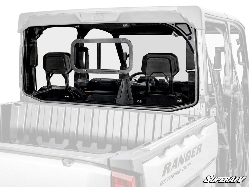Rear view of a Polaris Ranger XD 1500 shows its Sliding Rear Windshield with a center sliding window, visible cargo bed and partial cab; SuperATV logo appears in the bottom right corner.