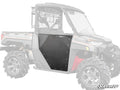 A Polaris Ranger UTV features Polaris Ranger XP Kinetic Aluminum Doors in black metal with visible bolts on the driver side, highlighted against a grayed-out vehicle. The SuperATV logo is displayed in the bottom right corner.