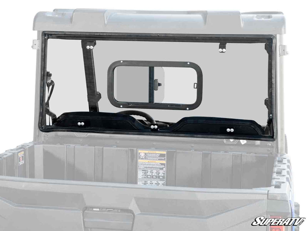 A clear Polaris Ranger Midsize Rear Sliding Windshield with a small rectangular sliding window is installed behind the cab on a gray utility vehicle. The SuperATV logo is shown in the bottom right corner of the image.