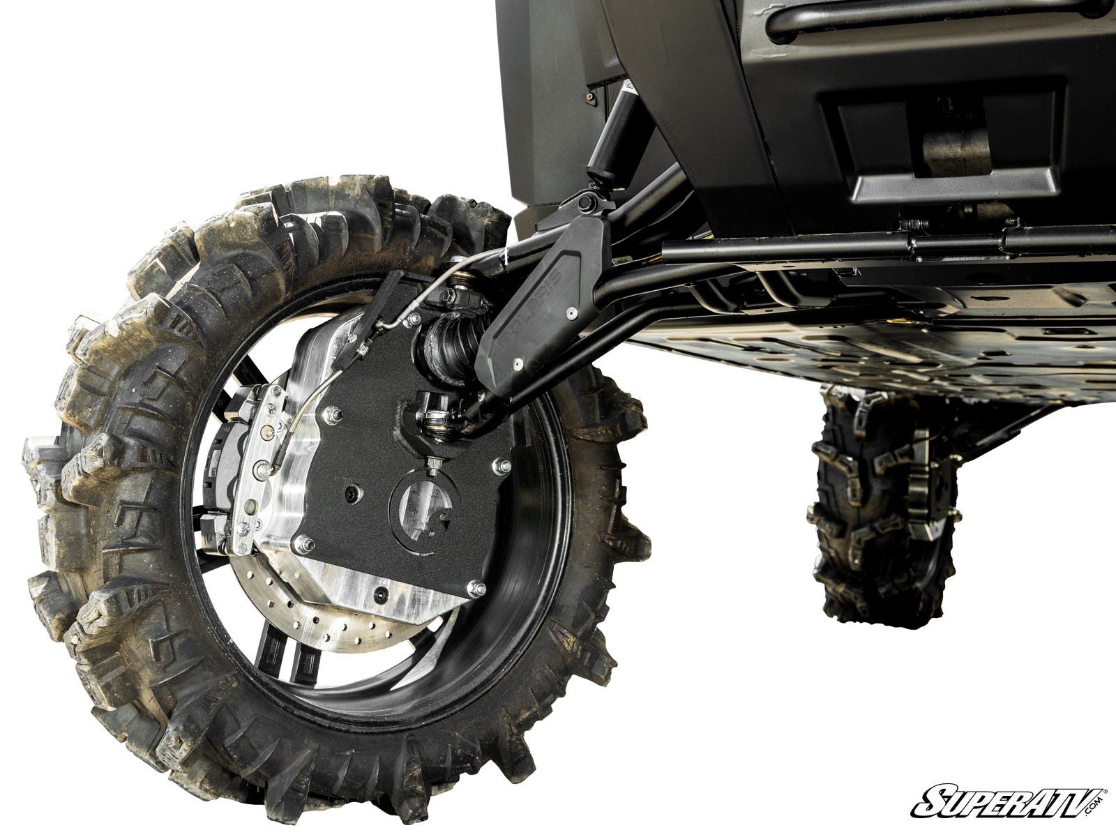 Close-up of a Polaris Ranger XD 1500 fitted with 8 GDP Portals shows its rugged rear suspension and large, thick-treaded tire. Suspension components and undercarriage highlight durability; SuperATV logo appears bottom right. Ground not visible.