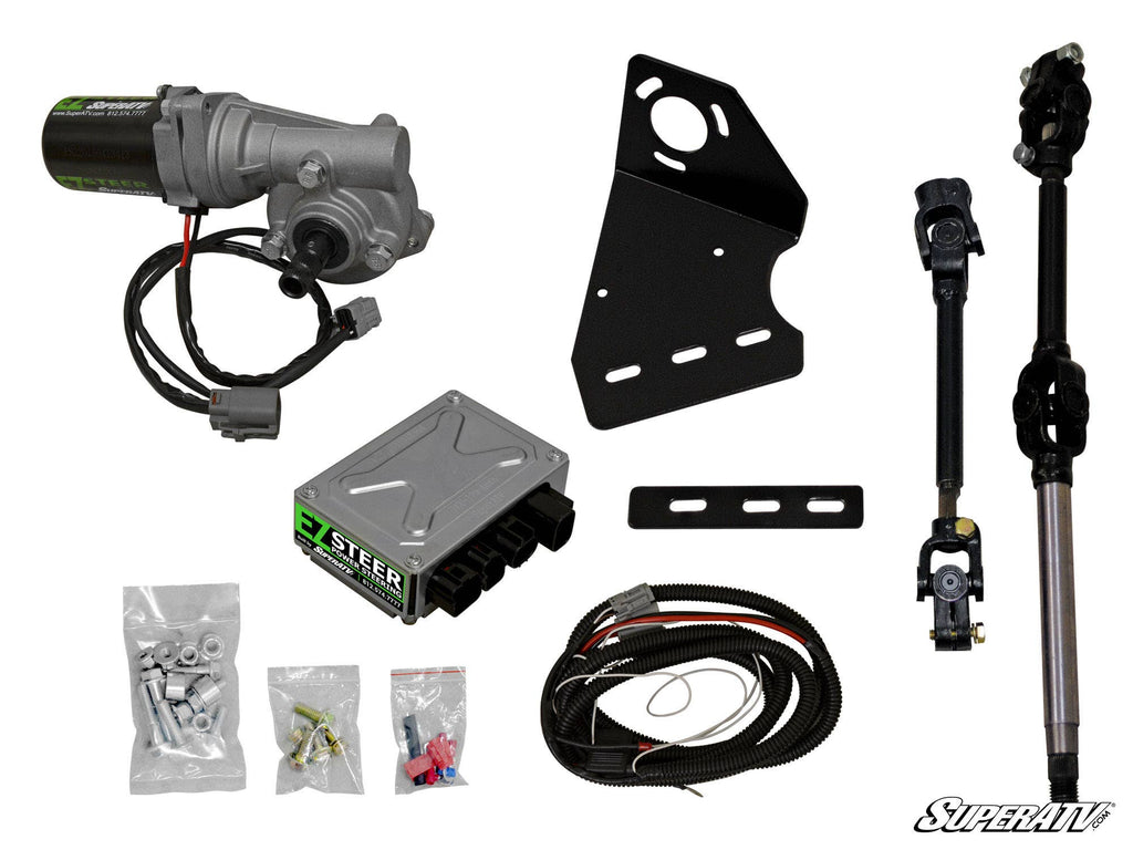 The Polaris Ranger XP 900 Power Steering Kit is shown on a white background with its motor, mounting brackets, control module, hardware packs, wiring harness, and steering shaft. The SuperATV logo appears in the bottom right corner.