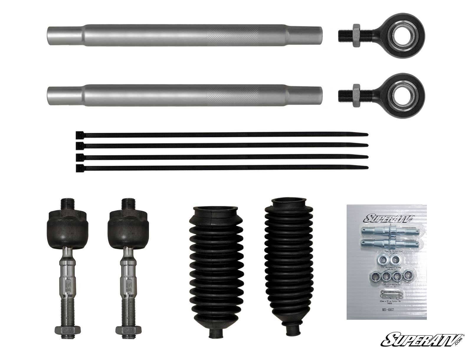 The Bobcat UV34 Heavy-Duty Tie Rod Kit includes two metal rods with Heim joints and threaded ends, two tie rod ends, two black accordion-style rubber boots, four black zip ties, an instruction manual, and assorted nuts and washers.