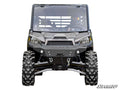 Front view of a rugged gray Polaris Ranger XP 570 3 Lift with large knobby tires, bumper winch, and helmeted driver visible through the windshield. White background with “SuperATV” branding in the corner.