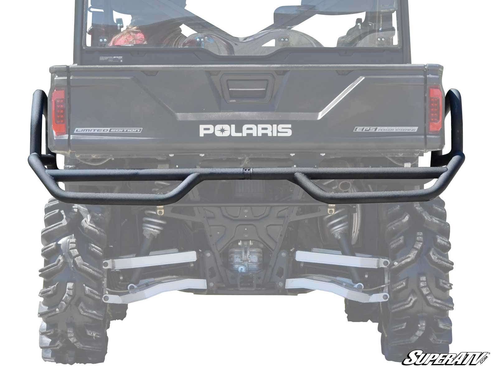 Rear view of a black Polaris Ranger featuring the Rear Extreme Bumper With Side Bed Guards, large off-road tires, visible suspension, and a tailgate with “POLARIS” in white. The “SuperATV” logo is shown in the bottom right corner.