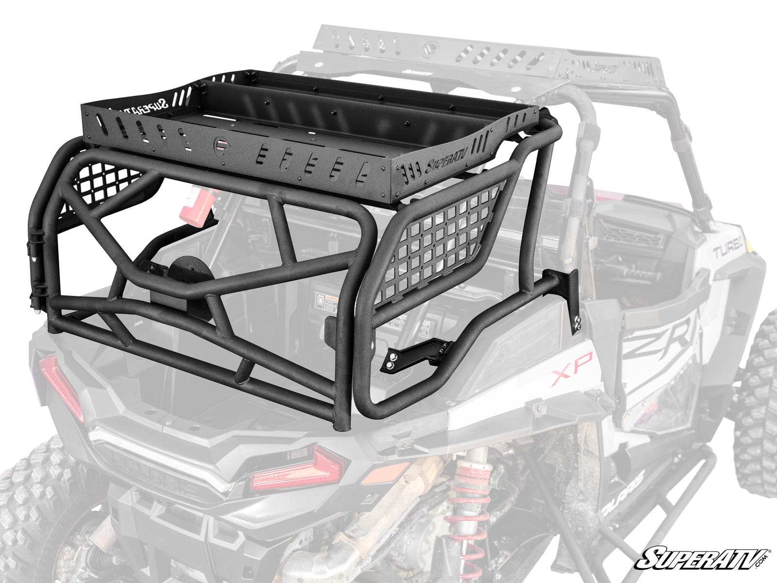 A Polaris RZR XP 1000 Outfitter Sport Bed Rack, made of heavy-duty black tubular steel with mesh sides and a solid tray with side holes, is shown mounted on the back of an off-road vehicle. The photo is grayscale except for the highlighted rack.