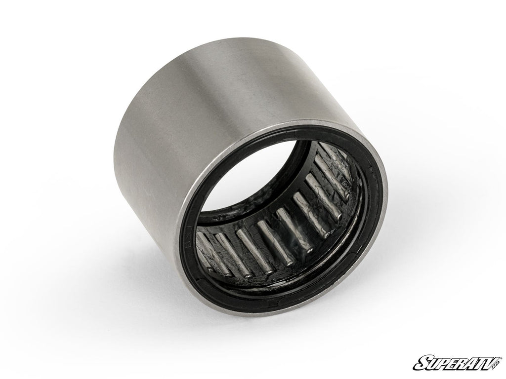 A close-up of the Up & Running Polaris General Primary Clutch Bearing shows its cylindrical metal shell and needle rollers inside, angled on a white background. The bottom right displays the black and white “SuperATV” logo.