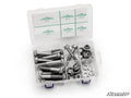 The Up & Running Polaris RZR XP Turbo S Suspension Bolt Kit is shown in a clear organizer box with six compartments holding assorted bolts, nuts, and washers. Green labels list part details on the lid. The SuperATV logo appears in the corner.