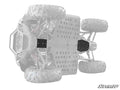 A greyed-out Polaris RZR 200 is shown from underneath, highlighting the dark metal skid plate mounted to the chassis for protection; visible tires and frame details, with a SuperATV logo in the lower right corner.