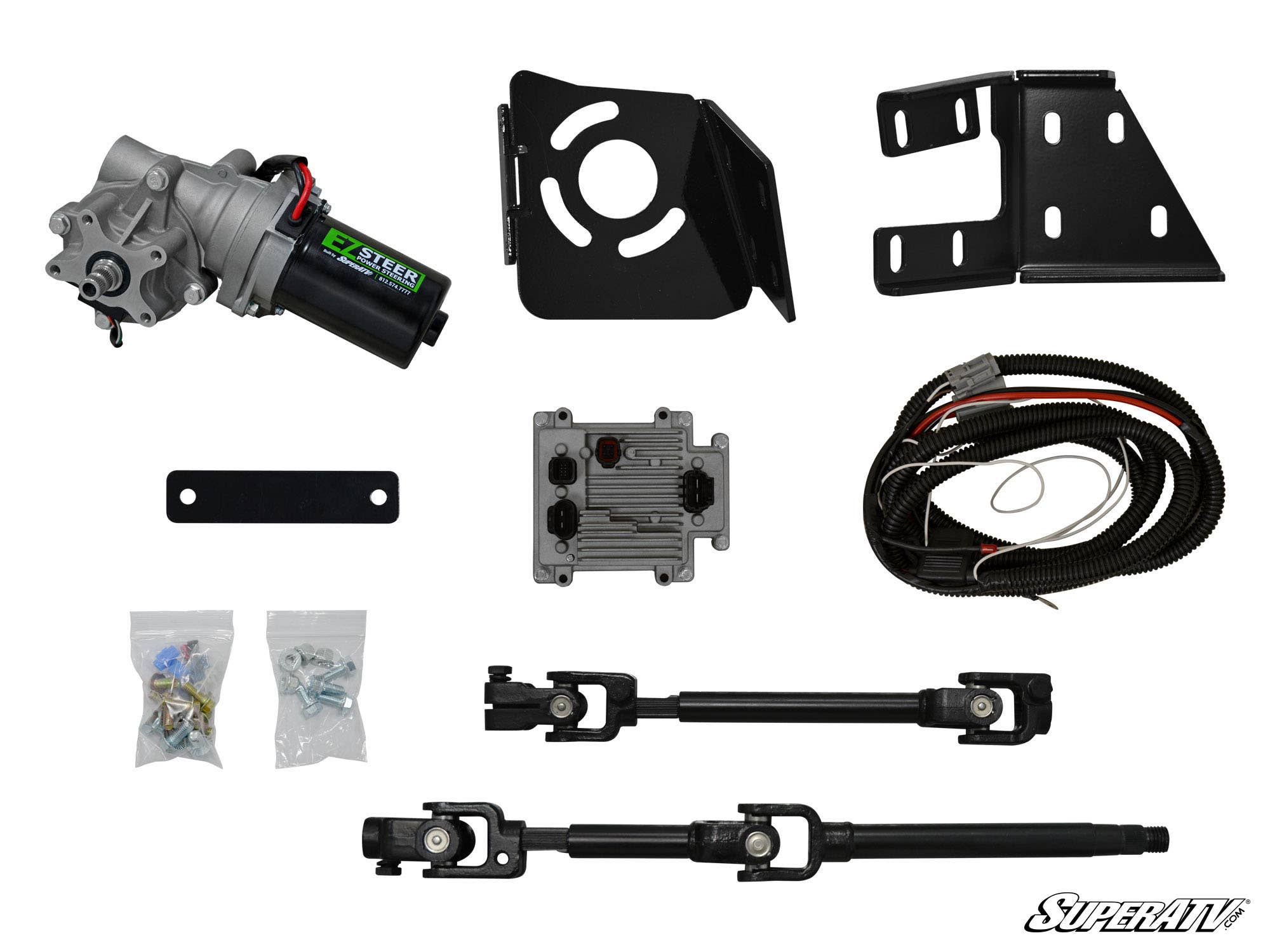 Overhead view of the Polaris RZR 900 Power Steering Kit, featuring a motor, wiring harness, two mounting brackets, control box, hardware bags, metal plate, and two black steering shafts arranged on a white surface with the SuperATV logo in the corner.