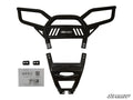 A black metal Polaris RZR S 1000 Rear Bumper kit is shown, featuring a large angular main bumper, lower bracket, two mounting plates, screws, and an instruction sheet. The SuperATV logo is visible in the corner.