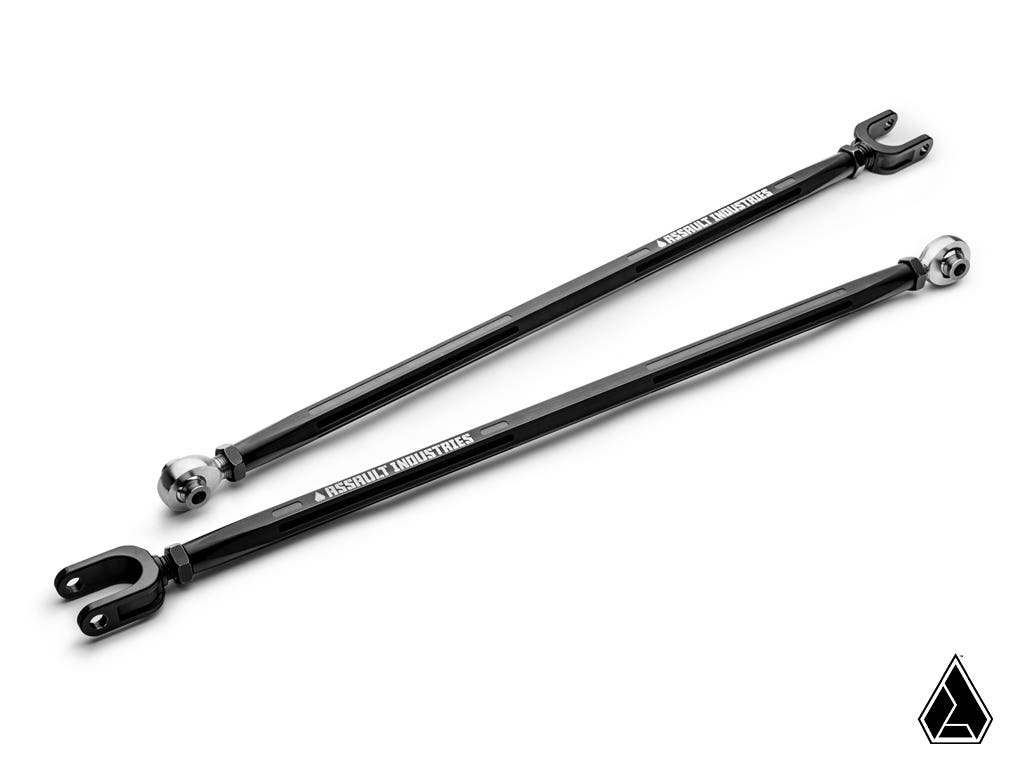 Two black, metal Assault Industries Polaris RZR Pro R Turret Style Heavy-Duty Toe Link Kit arms with silver joints at each end lay diagonally on a white background. VERSATILE INDUSTRIES appears on each arm with a small black geometric logo in the corner.