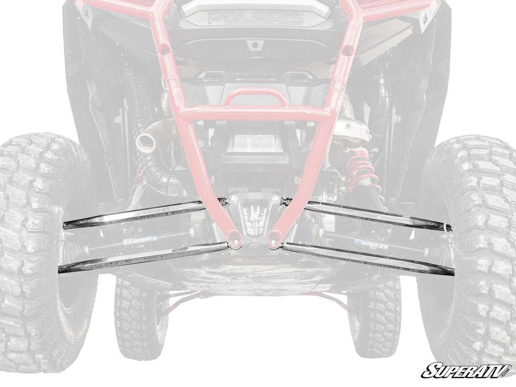 Close-up of an off-road vehicle’s undercarriage, focusing on a reinforced red frame and black Polaris RZR XP 1000 Billet Aluminum Radius Arms by SuperATV. The SuperATV logo appears in the lower right; most of the vehicle is faded out to highlight these co