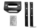 The Polaris RZR Winch Mounting Plate includes a black metal bracket with a rectangular cutout, two black metal support bars with holes, and a bag of assorted bolts and hardware, all displayed on a white background with the SuperATV logo in the lower right