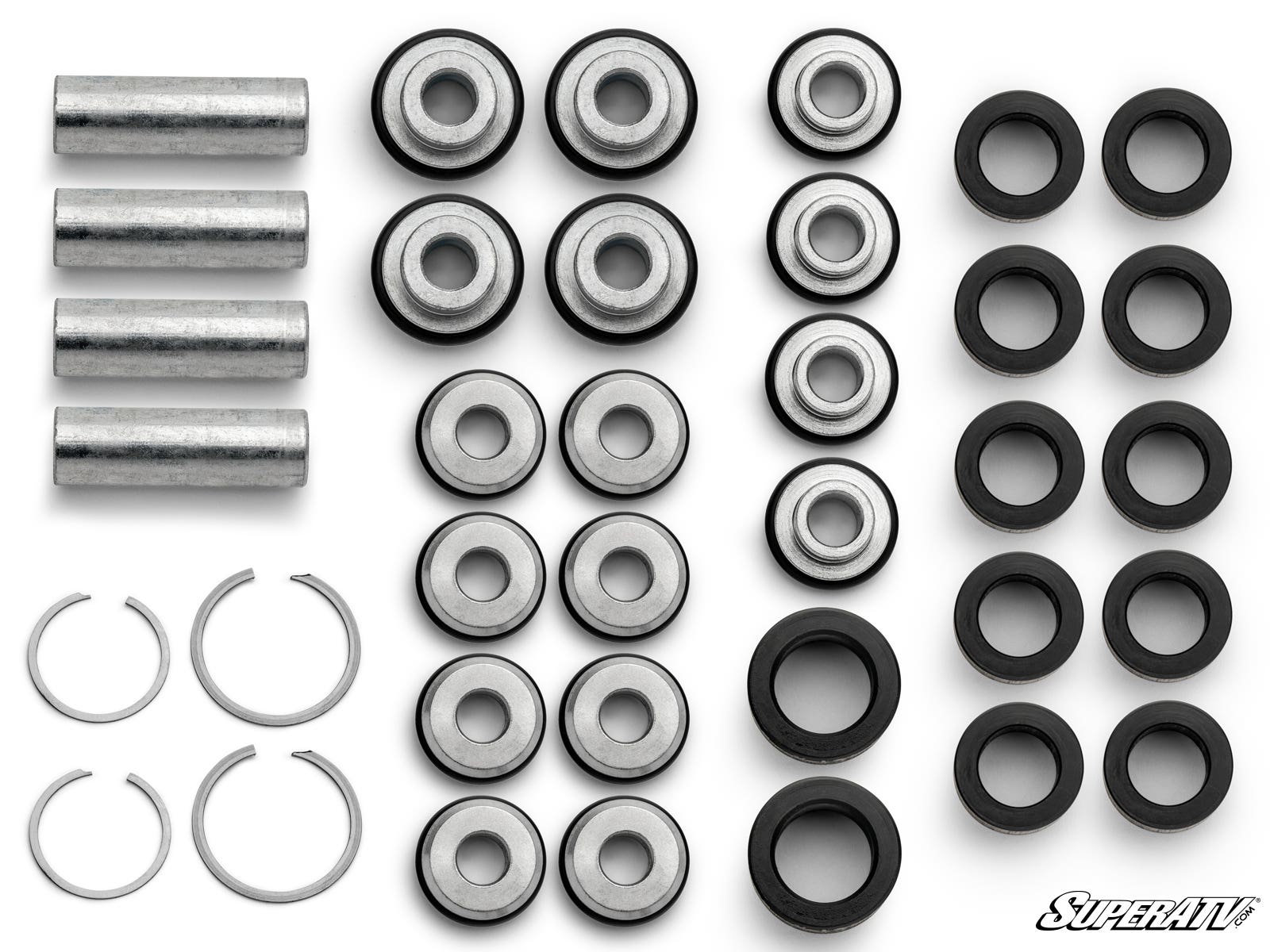 A neatly arranged kit of Polaris RZR XP A-Arm Bushings, including metal bushings, spacers, snap rings, and black rubber seals, is displayed in a grid on a white background with the SuperATV logo in the bottom right corner.
