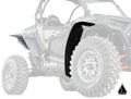 The Assault Industries Low Profile Fender Flare is shown installed on the rear wheel arch of a Polaris RZR XP Turbo, with detailed focus on its precise fitment and a geometric logo in the corner.