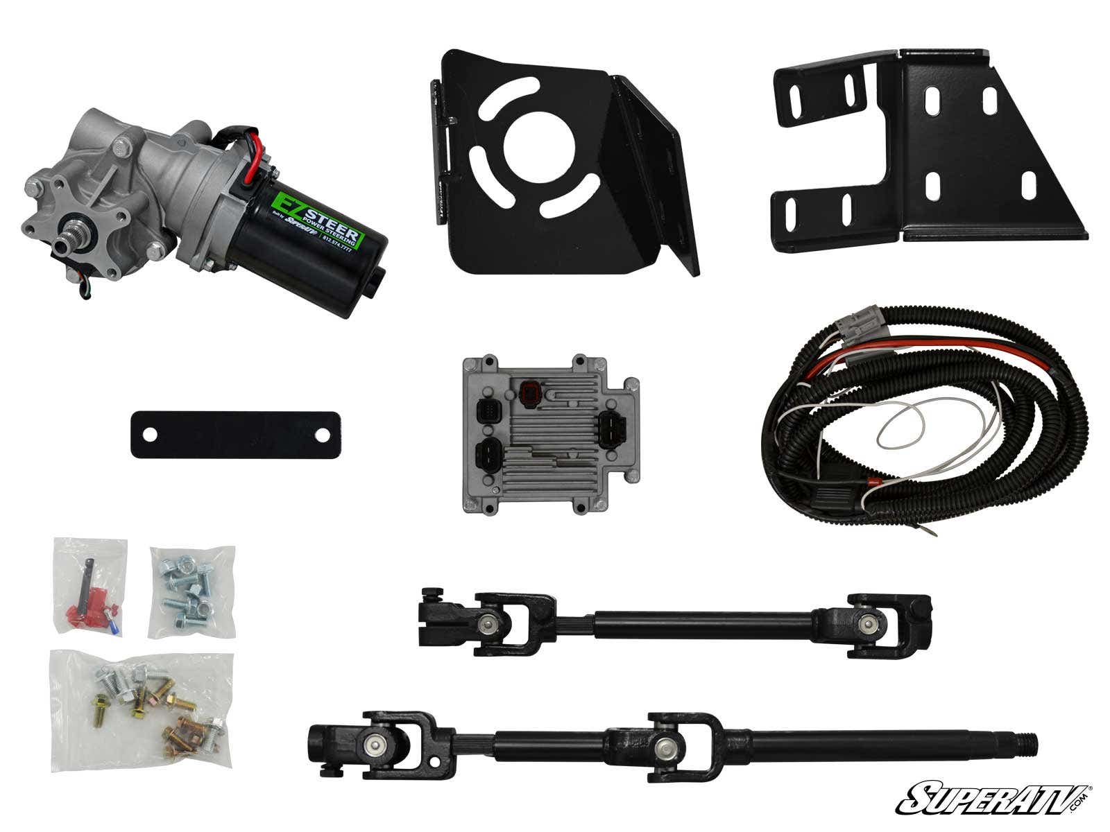 The Polaris RZR XP Turbo Power Steering Kit includes a motor assembly, brackets, mounting plate, black metal control module, wiring harness, two black steering shafts with joints, hardware packs with bolts and terminals. SuperATV logo in bottom right.