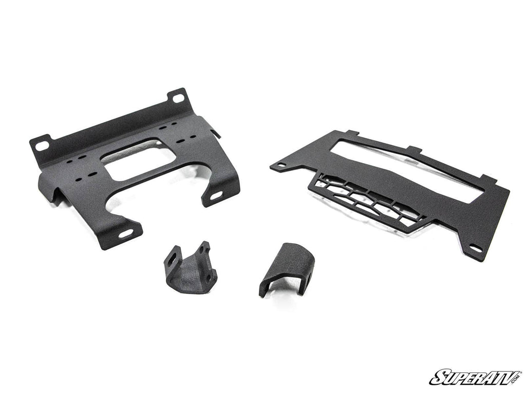 Four black metal Polaris RZR S 1000 Winch Mounting Plates with cutouts and mounting holes are displayed separately on a white background. They vary in size and shape, with SuperATV in a stylized font at the bottom right corner.