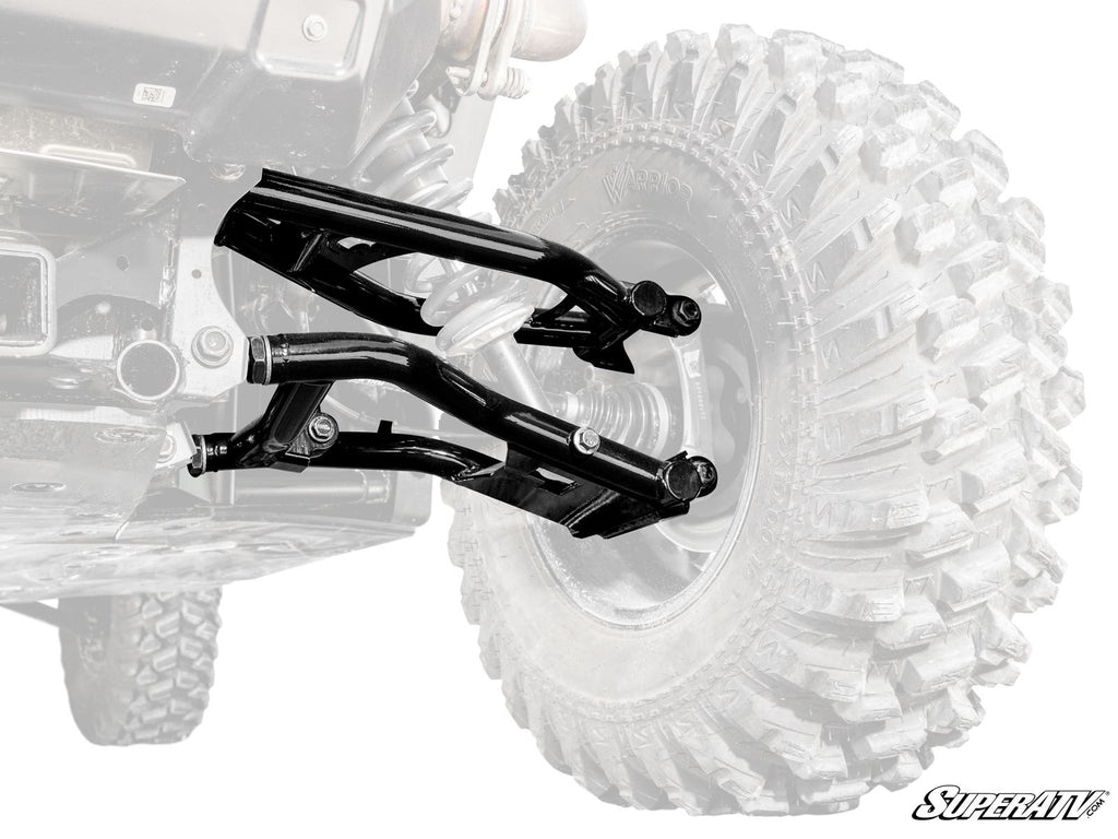 A black Polaris Xpedition Atlas Pro Rear A-Arm is shown over a faded off-road vehicle tire and undercarriage, with the SuperATV logo in the lower right. The image showcases the rugged design and precise fit of the A-Arm.