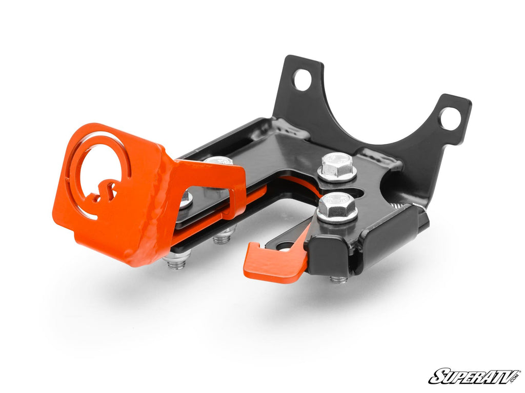 A black and orange metal Polaris Xpedition Brake Lock with bolts and a left-side circular cutout, featuring angled arms, multiple mounting holes, and photographed on white. The SuperATV logo appears in the bottom right corner.