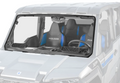 A close-up of a Polaris Xpedition Scratch Resistant Windshield on a gray off-road vehicle, showing two blue and black “Polaris” bucket seats, dashboard details, right-side steering wheel, and clear glass with wipers.