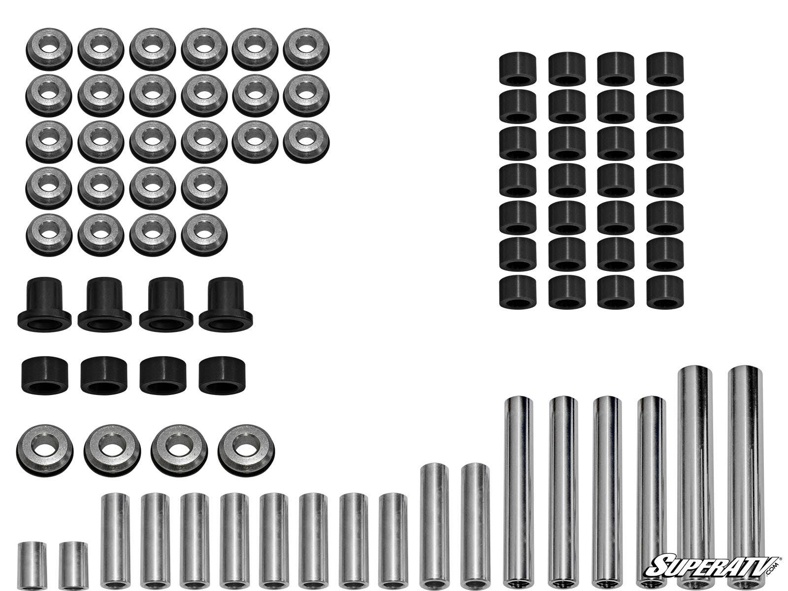 Polaris General A-Arm Bushings, including metal washers, black cylindrical bushings, hex spacers, and metal rods, are neatly arranged in rows on a white background. The SuperATV logo appears in the bottom right corner.