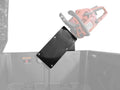 The Polaris General Chainsaw Mount is installed inside a storage box, securely holding a red chainsaw by its handle. The partially transparent chainsaw shows the fit on the mount. Safety and warning labels appear inside the box.