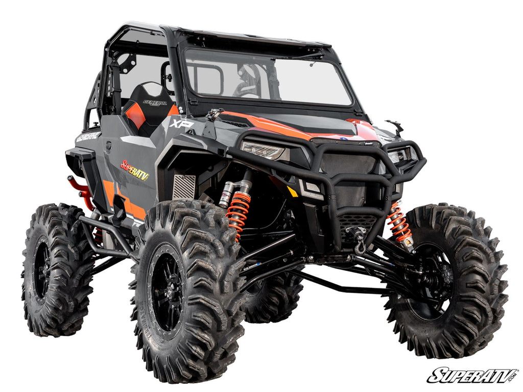 A Polaris General XP 1000 featuring a 4-6 Lift Kit, black and orange colors, large knobby tires, roll cage, reinforced bumper, red coil-over shocks, and the SuperATV logo shown in the bottom right.