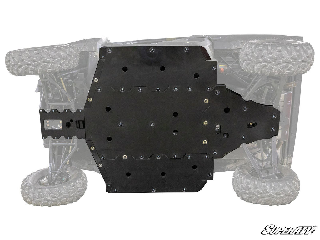 A view of the underside of an off-road vehicle shows a large, black Polaris Ranger 1000 Full Skid Plate covering most of the chassis. Four oversized, rugged tires sit at each corner, with the SuperATV logo in the bottom right corner.