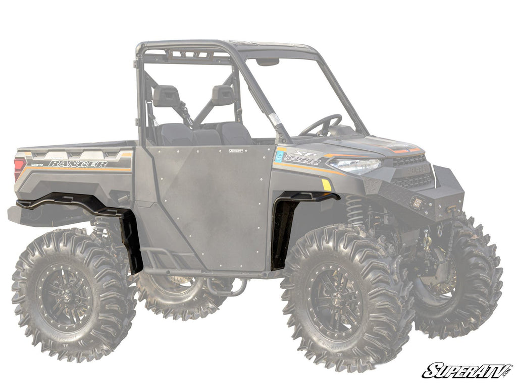A side view of a black Polaris Ranger XP 1000 with tall off-road tires and Polaris Ranger XP 1000 Fender Flares installed on the rear wheel wells; the faded body highlights the new fender flare components.