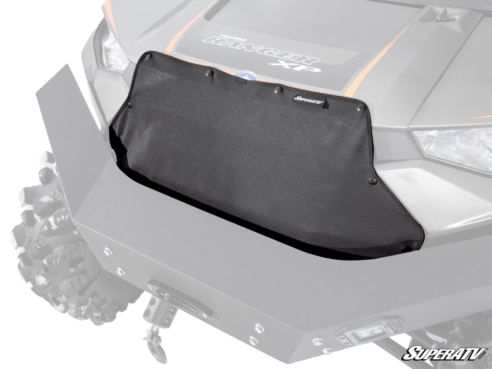 A Polaris Ranger XP 1000 Grille Cover in black mesh is mounted on the front of a gray off-road vehicle with rugged tires, an angular hood, and the SuperATV logo visible in the bottom right corner.