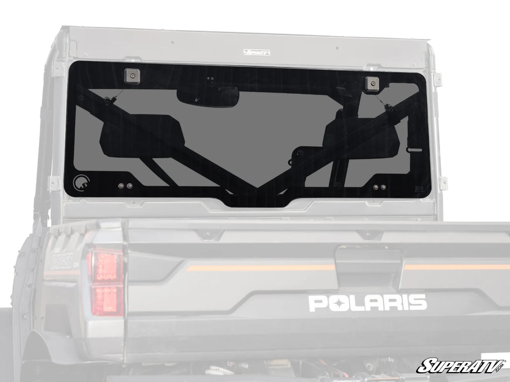 A Polaris Ranger XP 1000 Rear Glass Windshield with black trim is installed on the back of a gray Polaris off-road vehicle, featuring visible hinges, handles, and the SuperATV logo in the lower right corner.