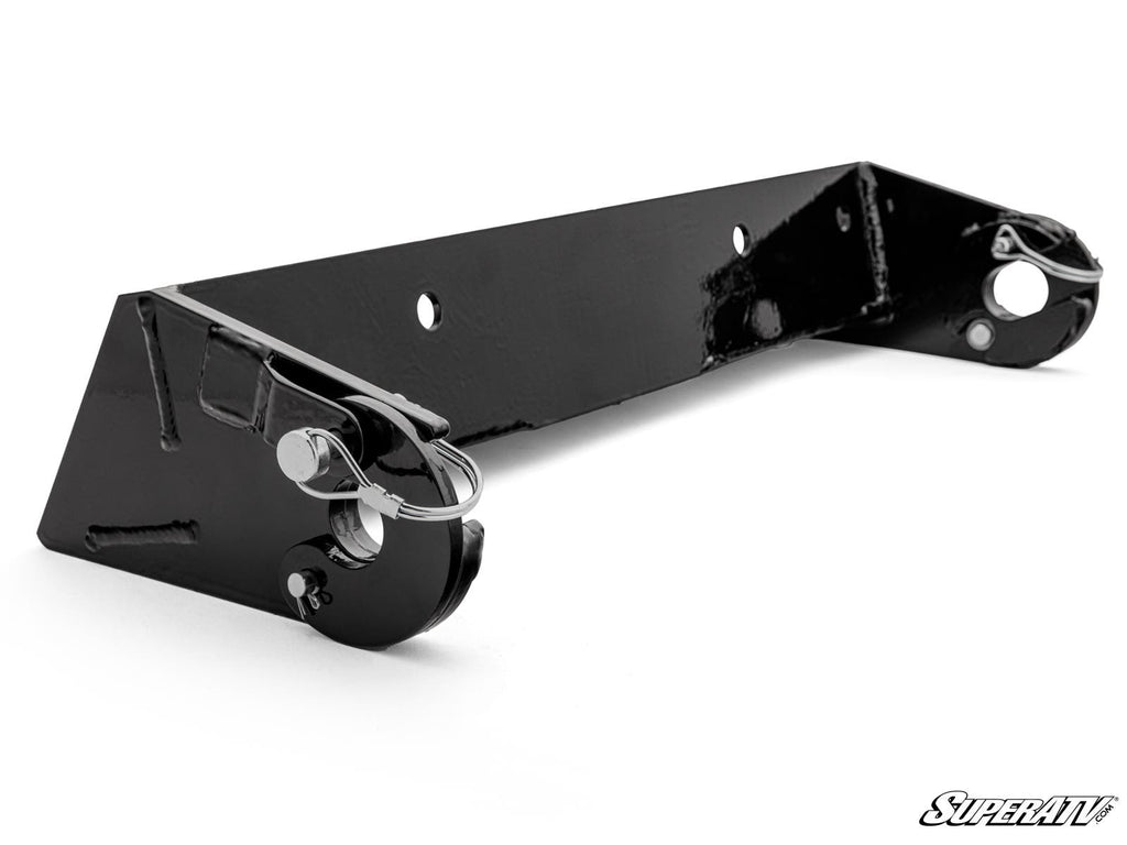 The Polaris Ranger XP 1000 Plow Pro Snow Plow Mount is a glossy black metal bracket with angular sides, three central holes, and hook-shaped ends with latch pins. The SuperATV logo appears in the bottom right corner on a white background.