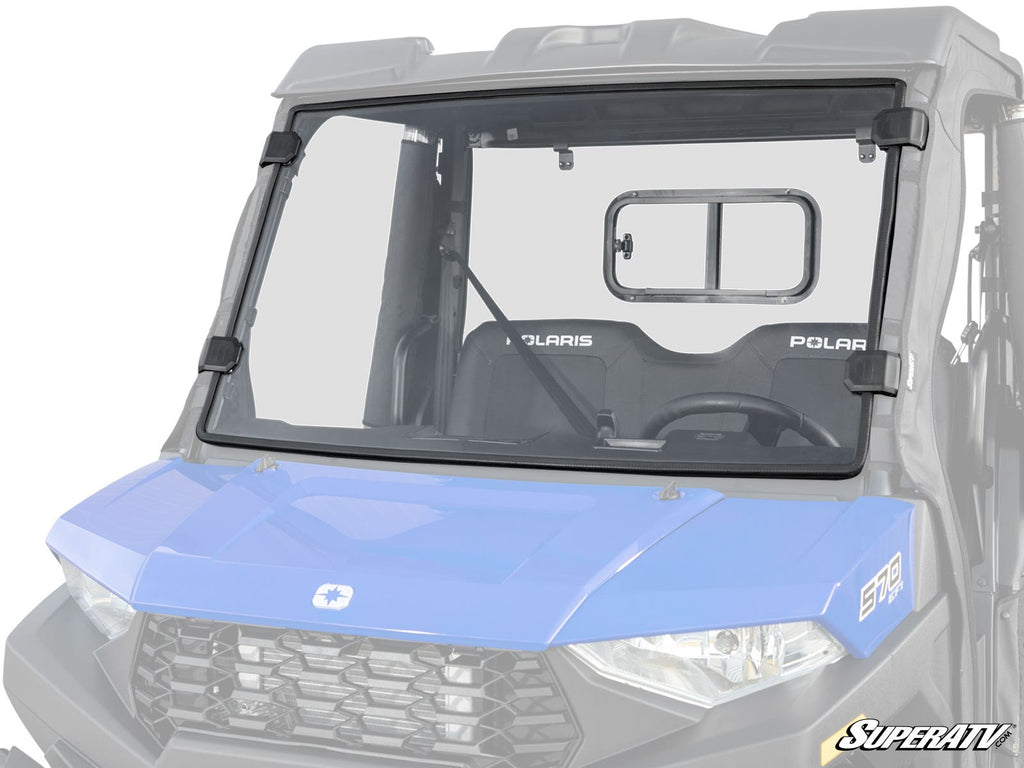 A blue Polaris UTV features a Polaris Ranger SP 570 Scratch-Resistant Full Windshield with a center sliding vent, black brackets, and SuperATV logo in the bottom right. The vehicles seats and steering wheel are visible.