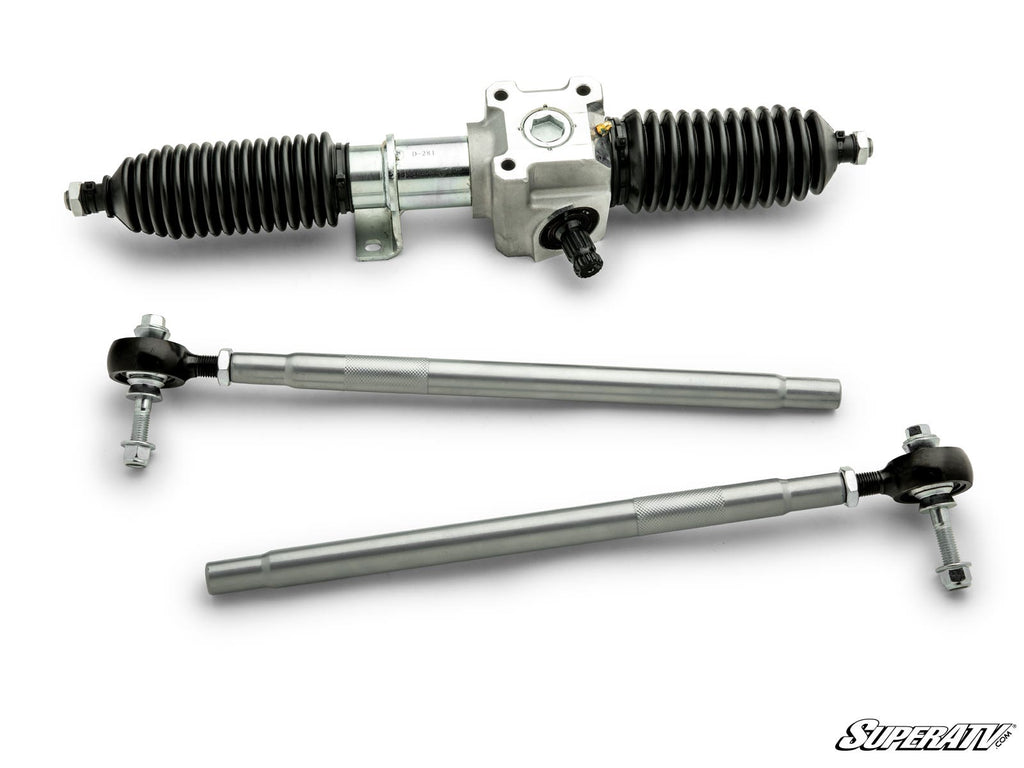 The Polaris Ranger XP 900 RackBoss 2.0 Rack and Pinion is displayed with silver steering rack, black rubber boots, and two long silver tie rods with ball joints, all arranged neatly on a white background featuring the SuperATV logo.