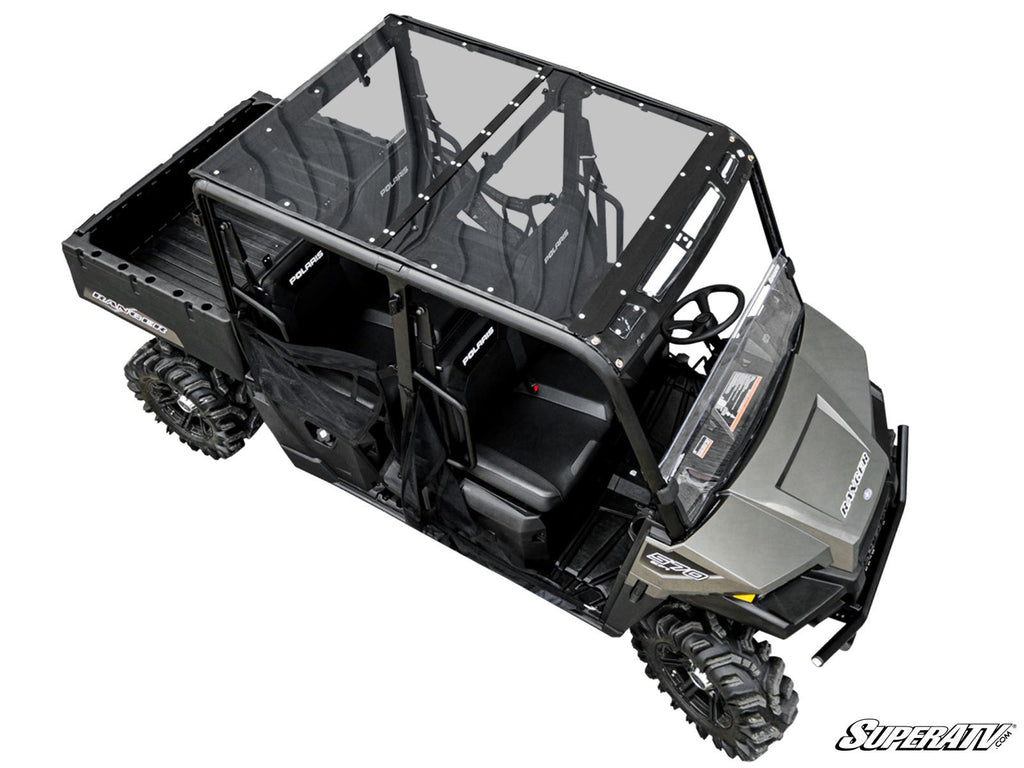 Overhead view of a gray Polaris Ranger Midsize 570 Crew with rugged tires, tinted roof, black mesh door inserts, rear cargo bed, and the SuperATV logo in the bottom right corner.