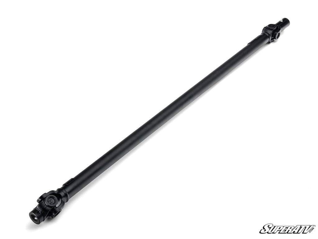 The Up & Running Polaris RZR 800 Front Prop Shaft Replacement, a black metal driveshaft with universal joints, is displayed diagonally on a white background. The SuperATV logo is in the lower right corner. The shaft is cylindrical and evenly machined.