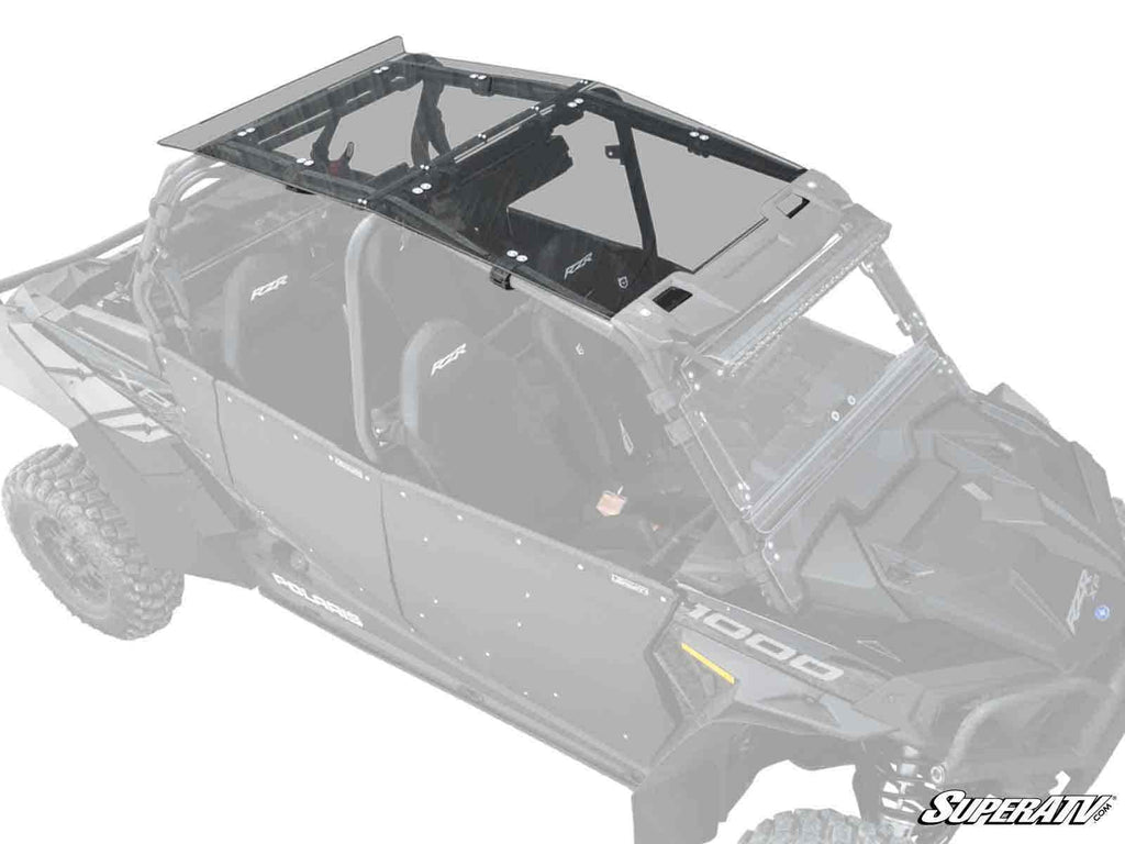 A black two-seat off-road UTV is shown from above, equipped with the Polaris RZR XP 4 Turbo Tinted Roof for interior visibility. The hood has angular lines, 1000 and RZR decals on the side, and a SuperATV logo in the lower right corner.