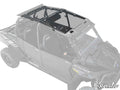 A black two-seat off-road UTV is shown from above, equipped with the Polaris RZR XP 4 Turbo Tinted Roof for interior visibility. The hood has angular lines, 1000 and RZR decals on the side, and a SuperATV logo in the lower right corner.