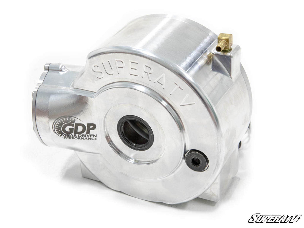 A shiny metallic Polaris Ranger Complete Differential housing with SUPERATV and GDP Gear Driven Performance engraved. It features a circular center opening, machined edges, a brass fitting, and a black screw on top. White background.