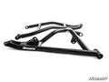 Two black metal Polaris RZR Turbo S High Clearance 1.5 Offset A-Arms feature tubular construction, angled and welded design, mounting brackets, and a white SuperATV logo on the side. The parts are photographed against a plain white background.