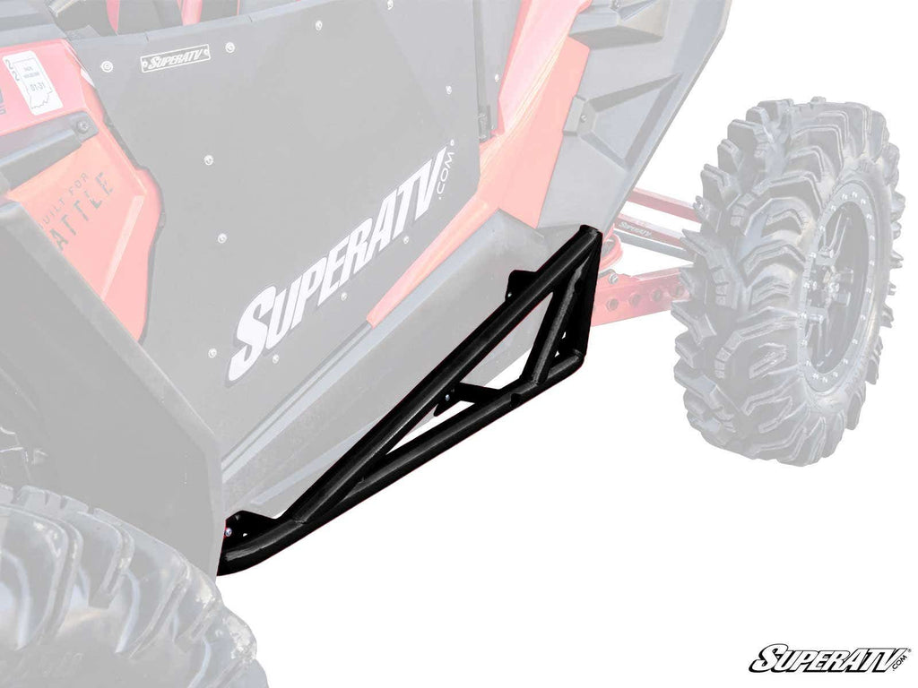 Polaris RZR XP Turbo S Nerf Bars in black metal are mounted along the side of a red off-road vehicle with large rugged tires, featuring “SuperATV” branding. The faded background draws attention to the nerf bars’ design and placement.