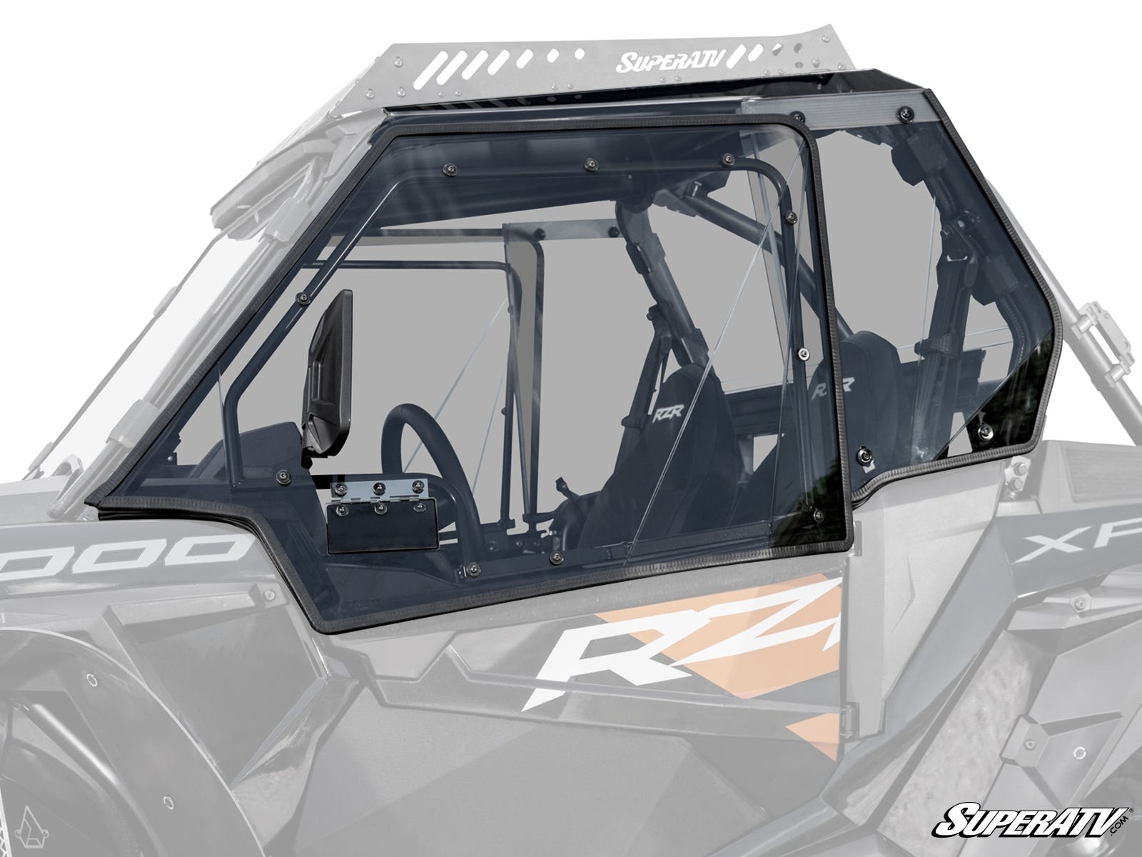 A close-up of Polaris RZR XP 1000 Hard Cab Enclosure Upper Doors shows tinted polycarbonate panels, a black frame, and interior details including seats, a partially visible steering wheel, and dashboard on a RZR side-by-side vehicle.