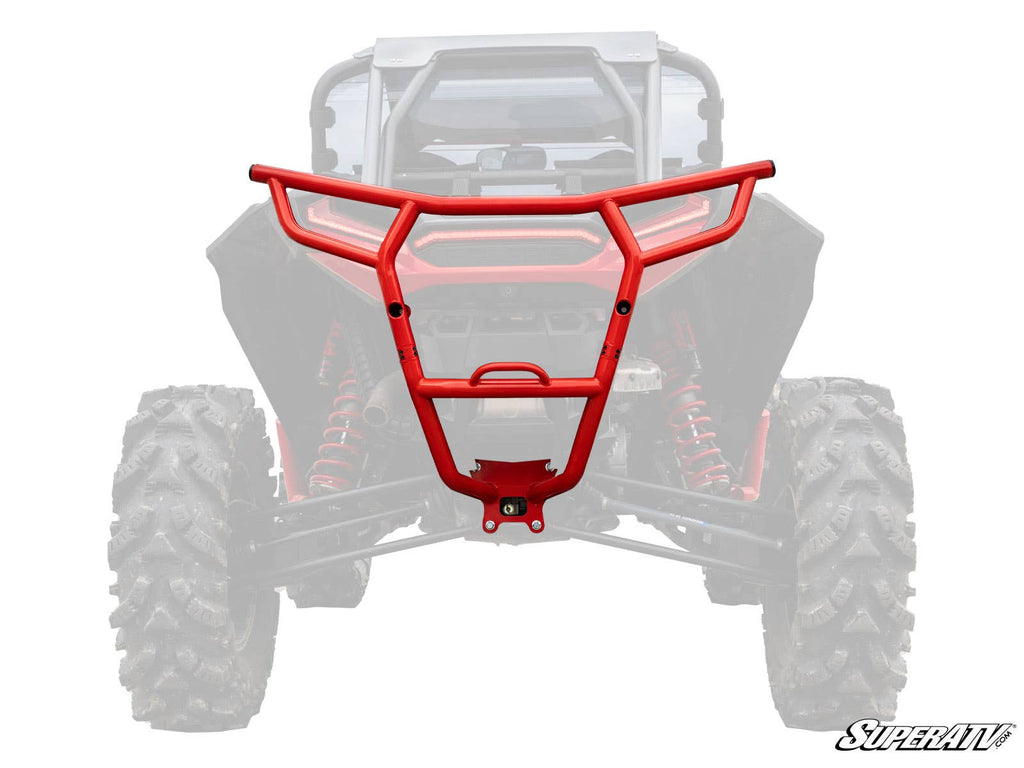 The Polaris RZR XP Turbo S Rear Bumper, featuring a rugged red angular design, is displayed in front of a partially transparent black and red side-by-side. The SuperATV logo appears in the bottom right corner.